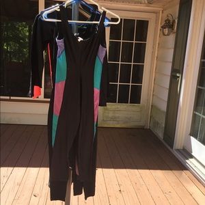 6 one-piece jumpsuits.